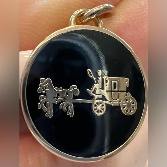 Coach Accessories - Adorable small Coach gold and black disc charm on a small gold ring